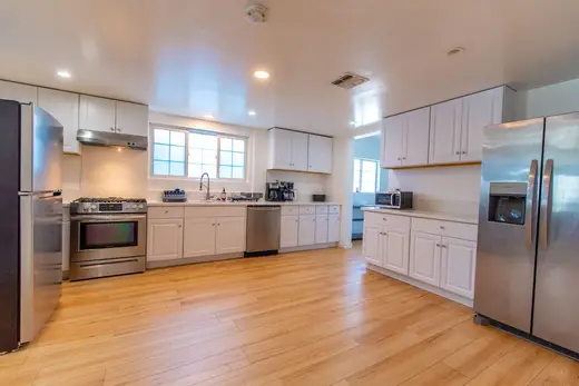 Modern kitchen with stainless steel appliances at Living Now Sober Living, a sober living home in Los Angeles.